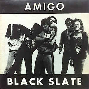 The album cover for Black Slate's Amigo. The whole image is black and white and depicts the band laughing with their arms round each other, some looking at each other. 'Amigo' appears in block capitals in white at the top of the cover and 'Black Slate' at the bottom in the same font.