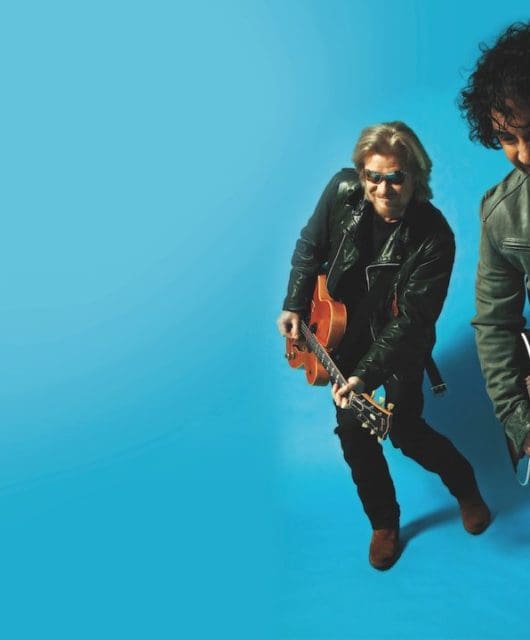 daryl and John blue background - mick rock