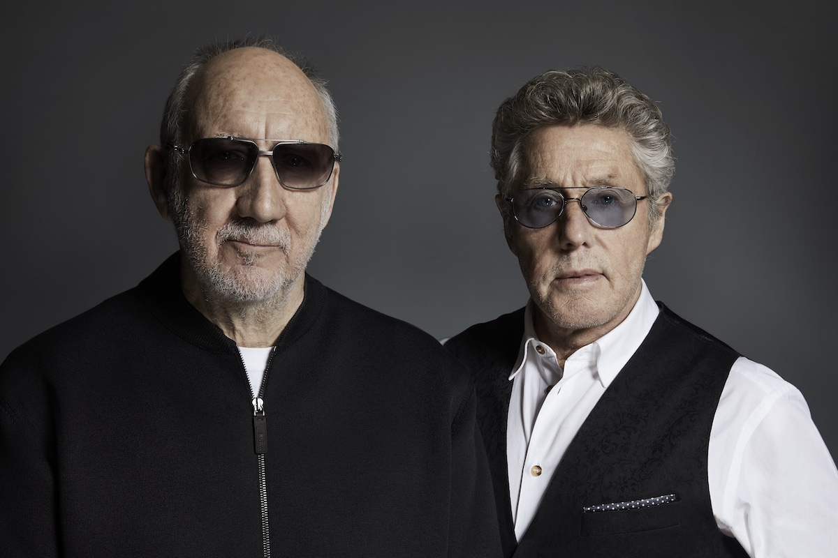 Pete Townshend and Roger Daltrey of The Who stand side by side facing forward