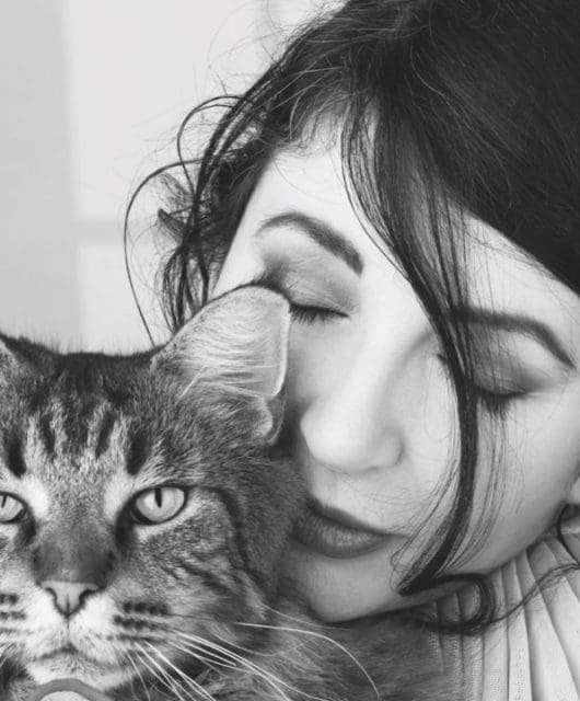 Black and white picture of Kate Bush with Cat