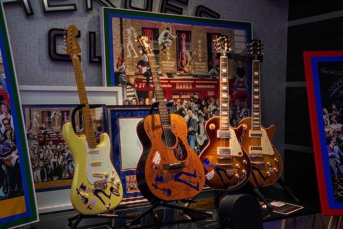 Four signed Mark Knopfler guitars